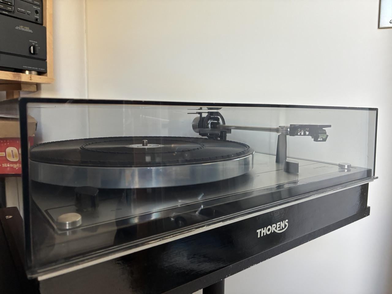 Thorens TD 166 met Shure 95 element.