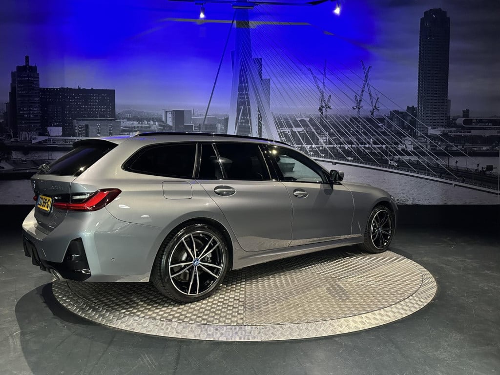 BMW 3-serie touring 330e xdrive *pano*360camera*sportstoelen*laser*