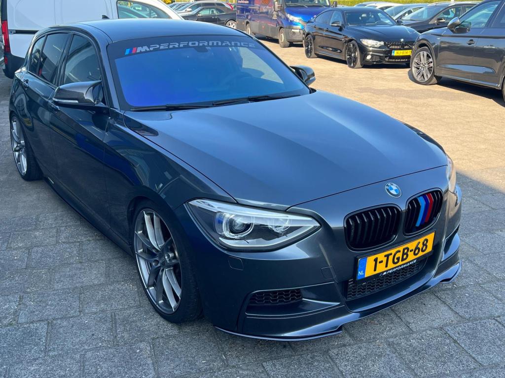 BMW 1 Serie m135i xdrive high executive, customized, stage 2 437 pk!