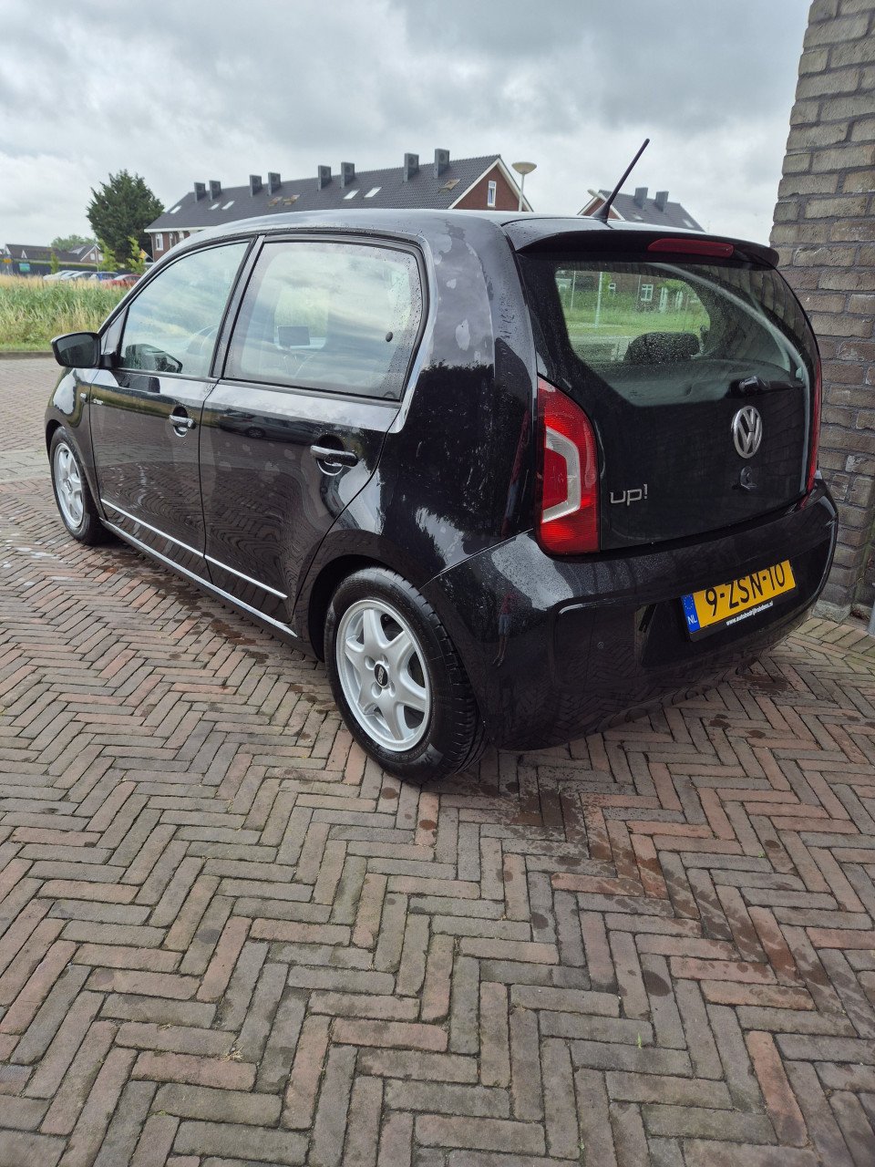 VW High Up BlueMotion 75 pk lederen stoelen