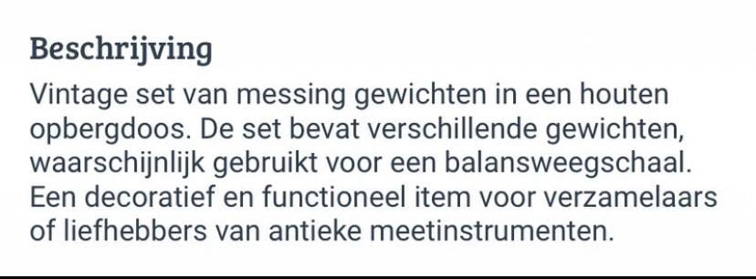 Oude gewichten in houten blok