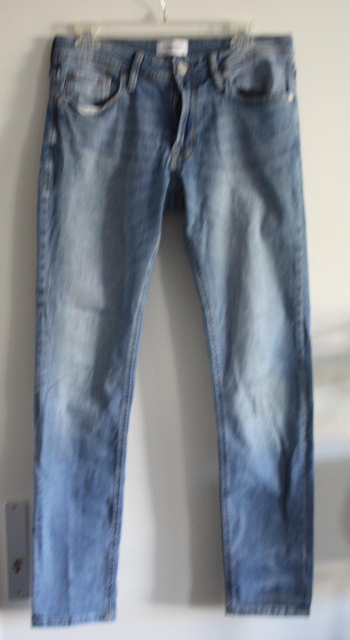 Licht blauwe spijkerbroek maat 31/32