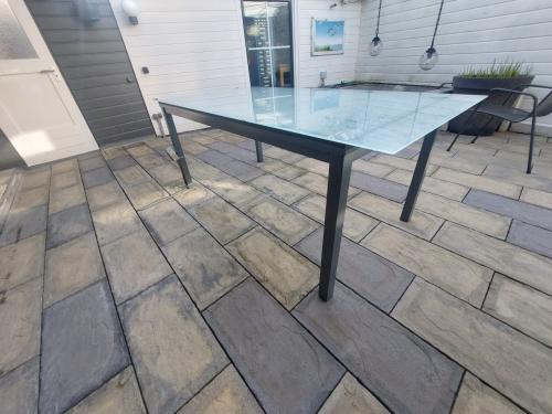 Tuintafel met glazen blad