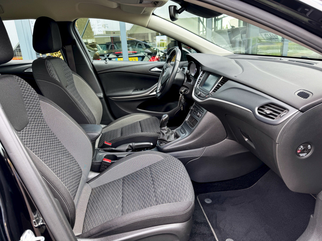 Opel Astra sports tourer 1.2 business edition+ navi ecc cruise