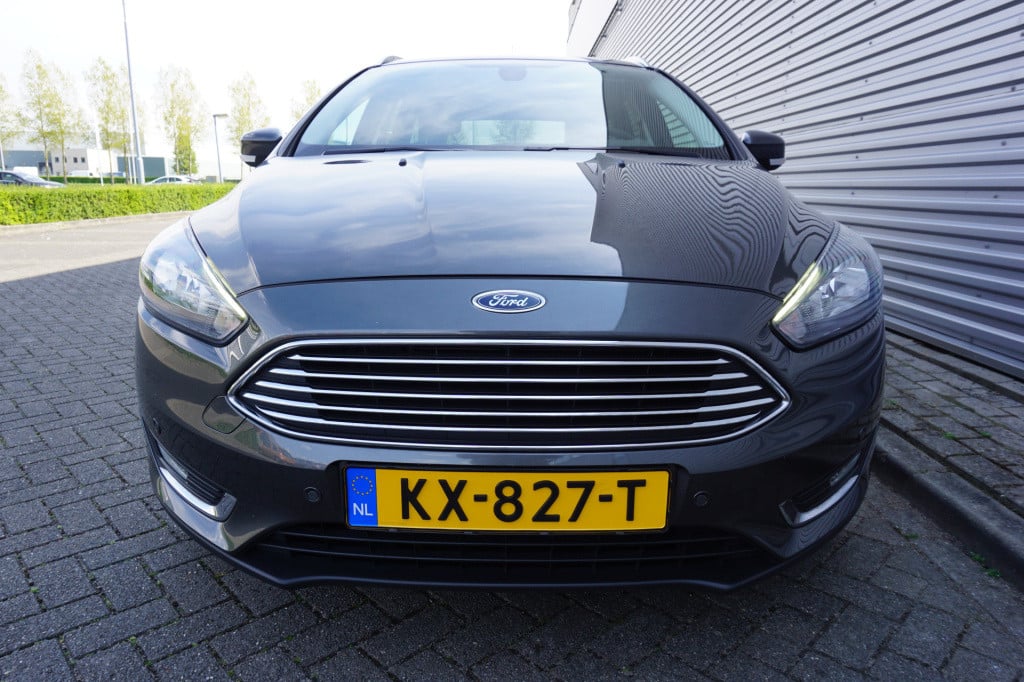 Ford Focus wagon 1.0 titanium climate / navi / stoelverw. / cruise / trekha