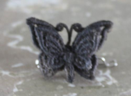 Stoffen vlinder broche