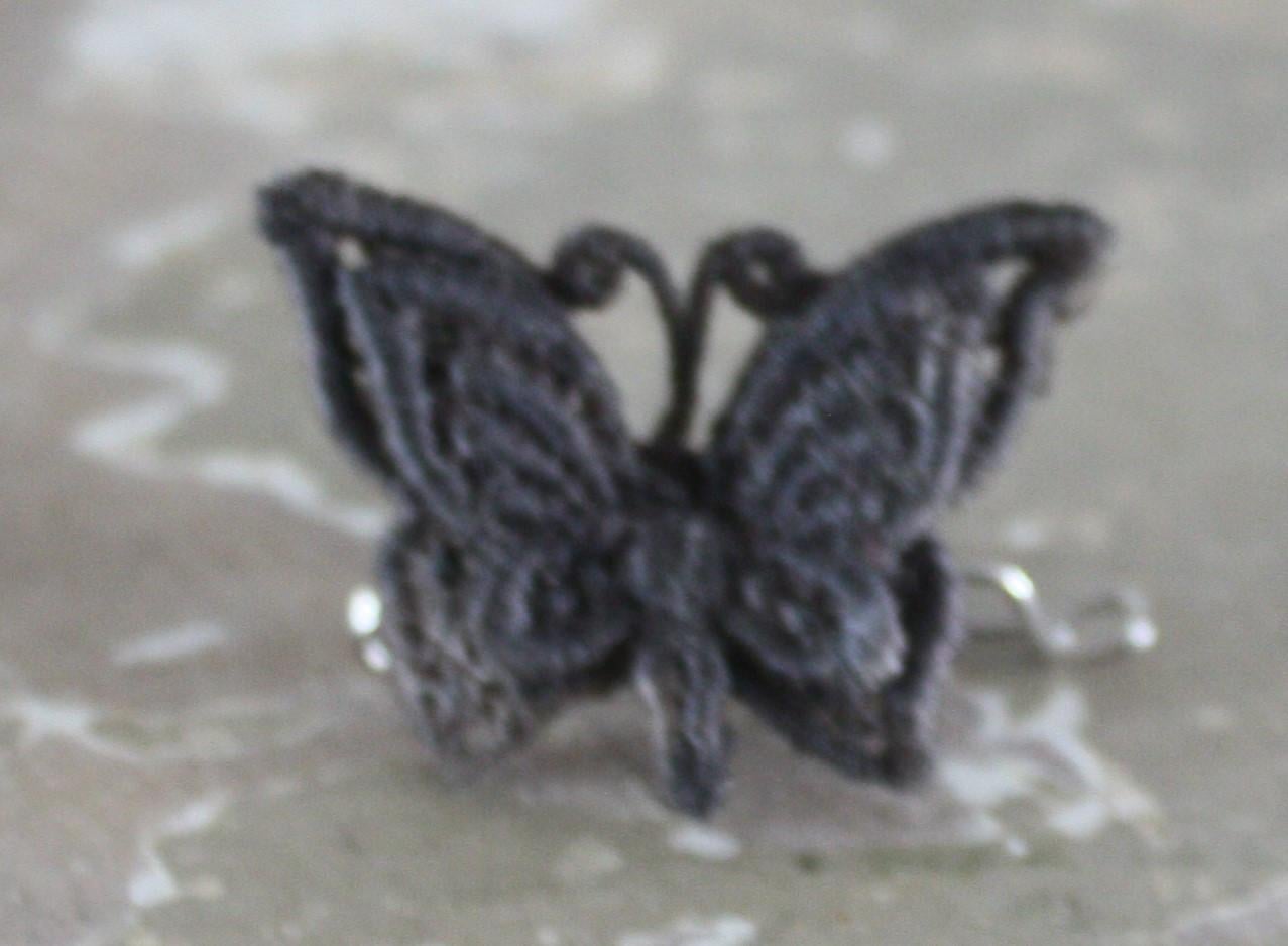 Stoffen vlinder broche