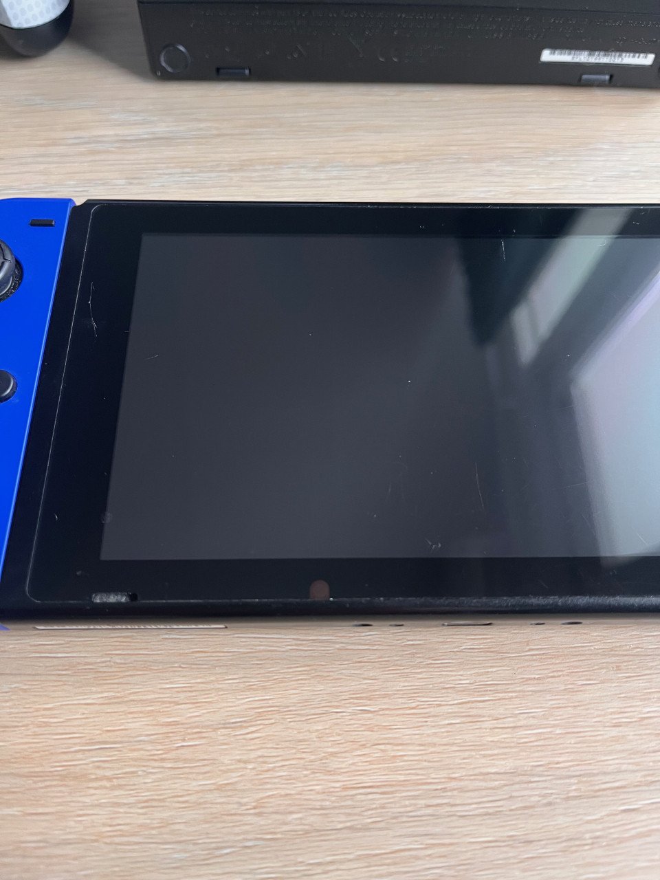 Nintendo Switch + extra controller + 6 games