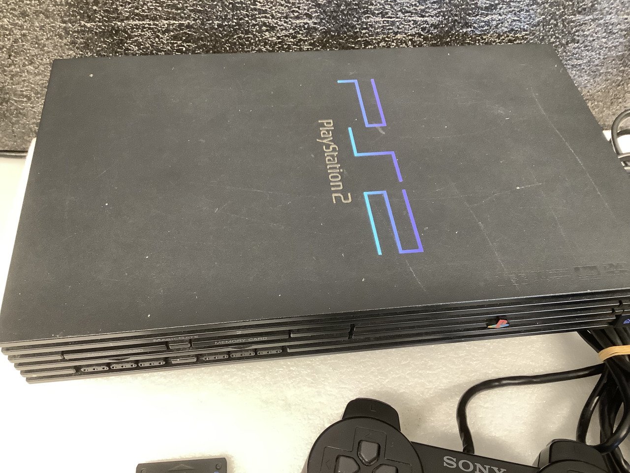 PlayStation 2 met 1 controller en 3 spellen GTA 4 + Pitfall.