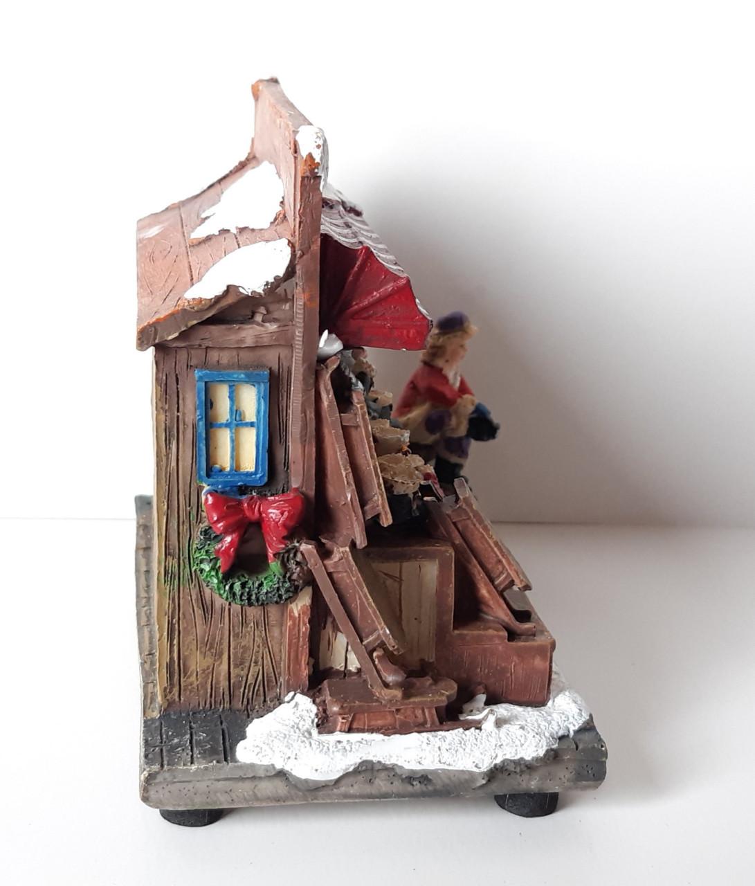 Hollands kraam: schaatsen en sleeën, kerstdecoratie met verlichting