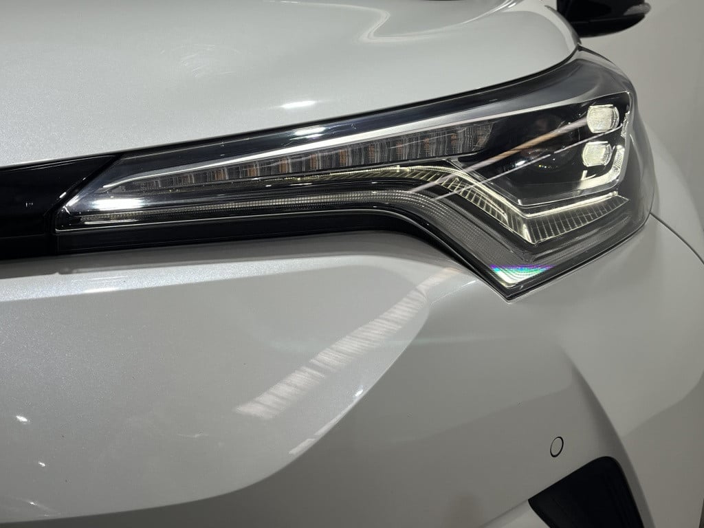 Toyota C-hr 1.8 hybrid bi-tone plus | leer | camera | trekhaak |
