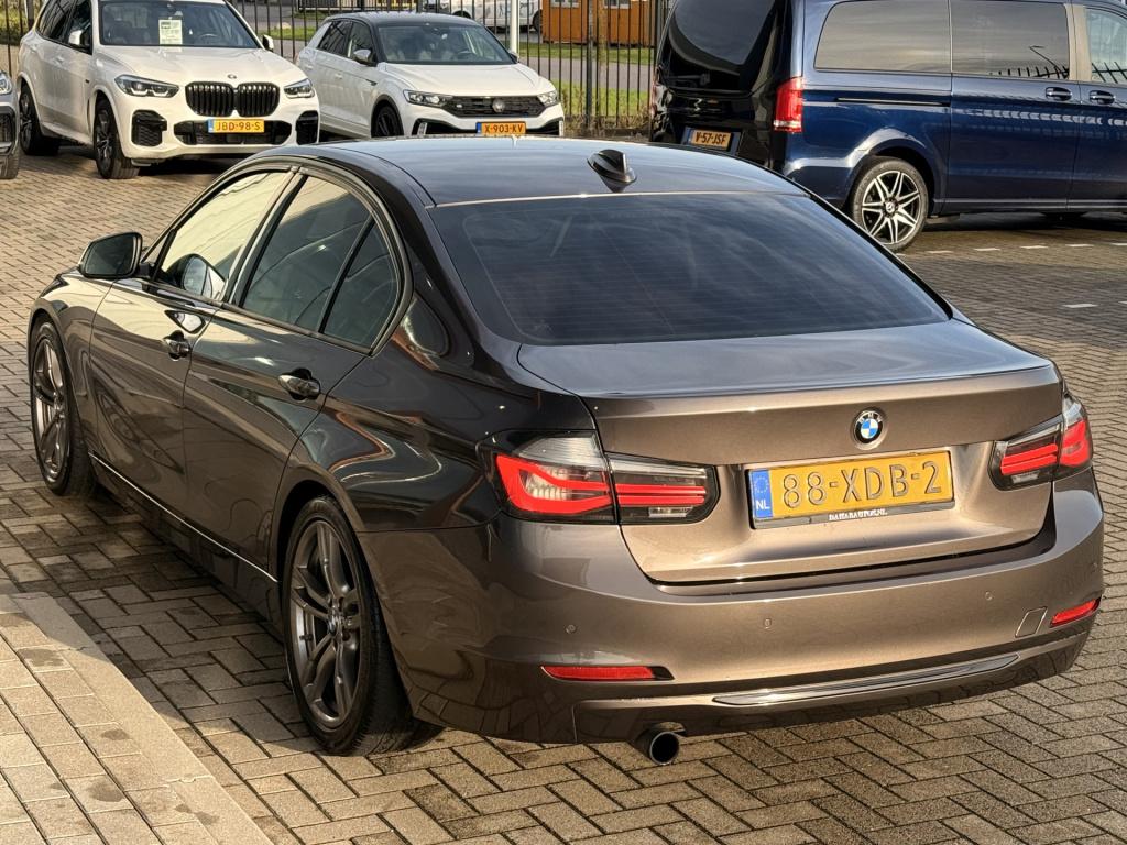 BMW 3-serie 320i high executive | harman/kardon | leder | v + a parkeersens