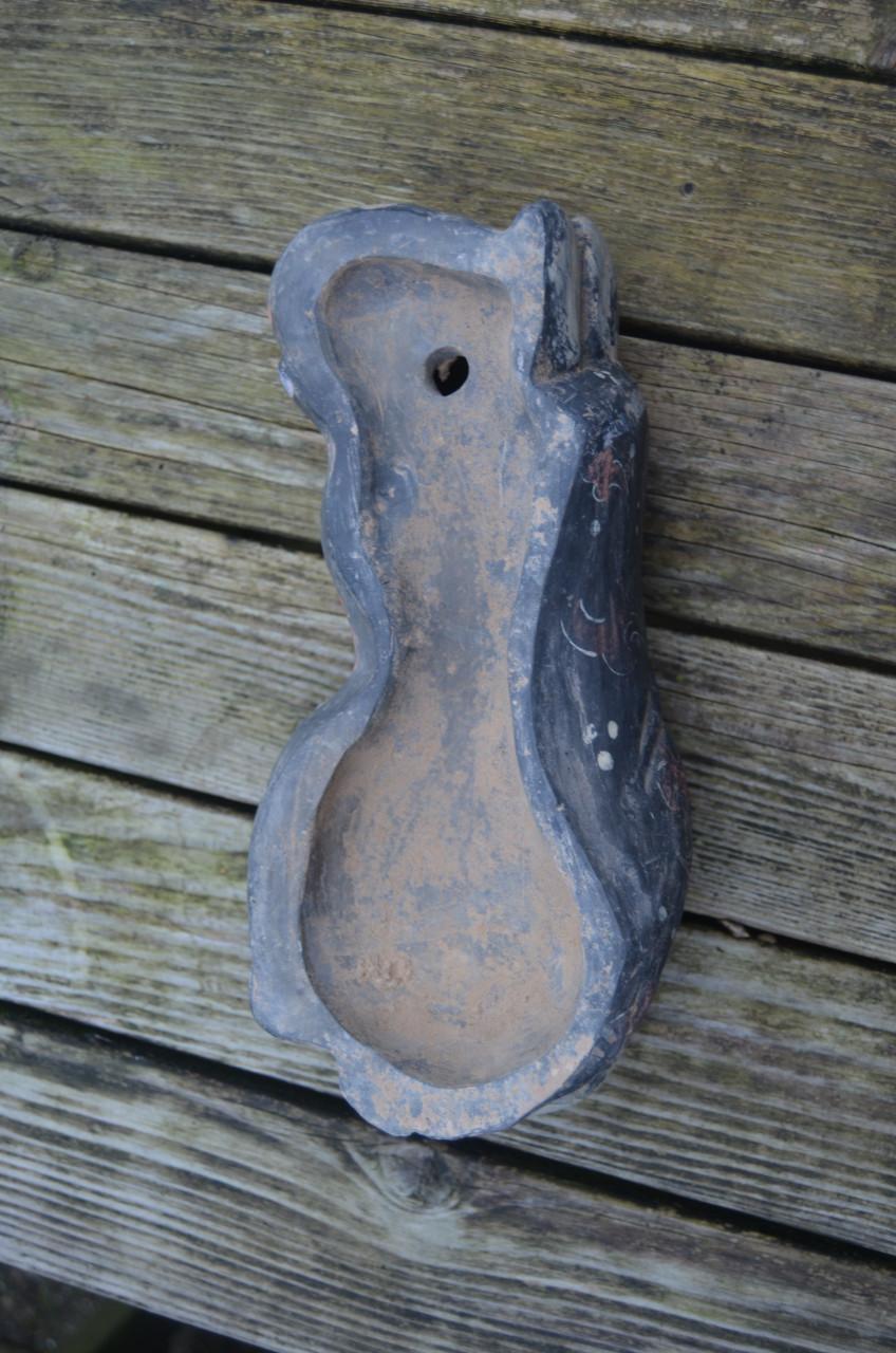 Chinees beeld van een slapend zotje ipst.