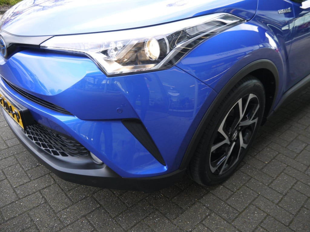 Toyota C-hr 1.8 hybrid bi-tone|dealeronderhouden|rijklaar