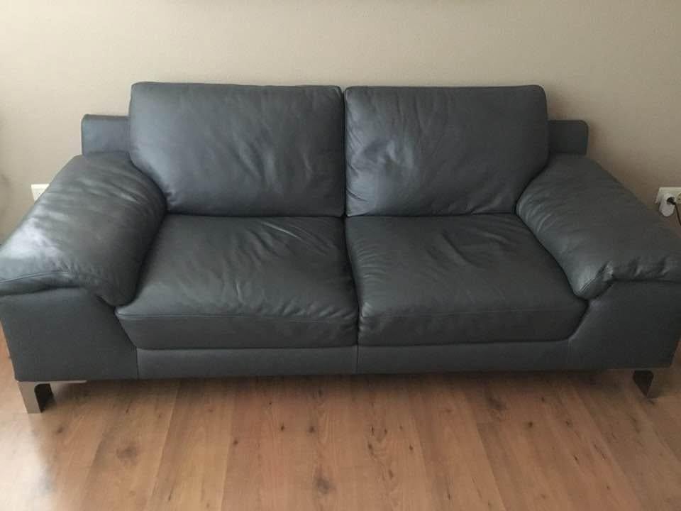 Te koop 2,5 zitsbank  donker grijs merk Natuzzi.