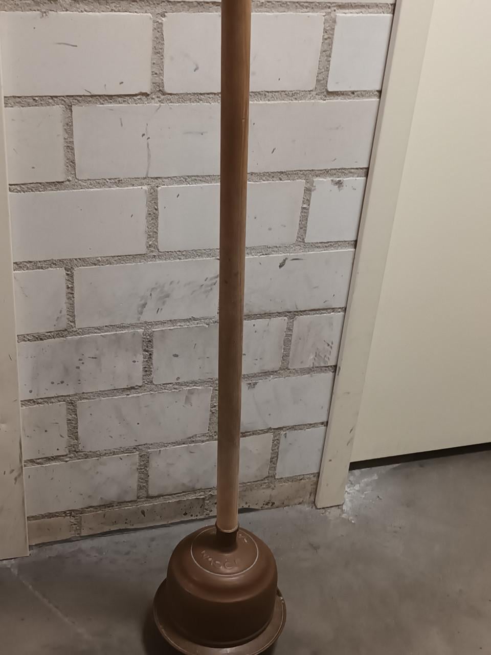 Oude koperen wasstamper