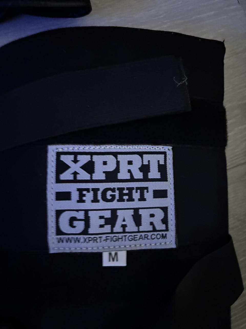 Kickboks handschoenen en scheembeschermers