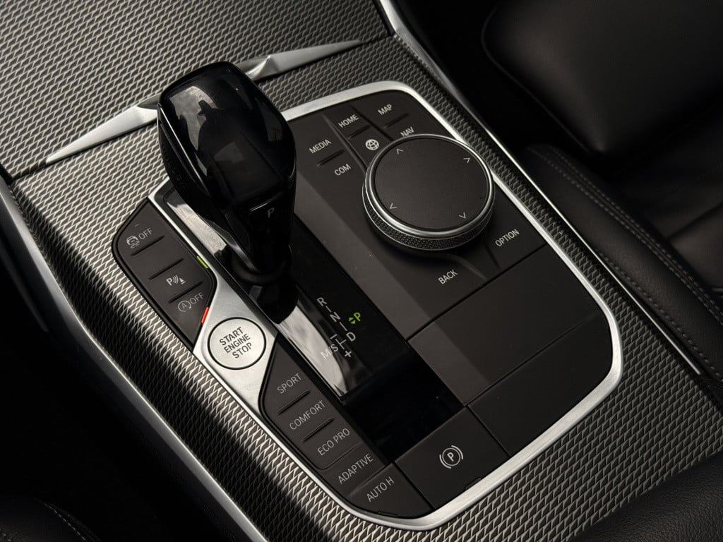 BMW 3-serie 320i m-sport | schuifdak | acc | leder | memory | laser | 20 in