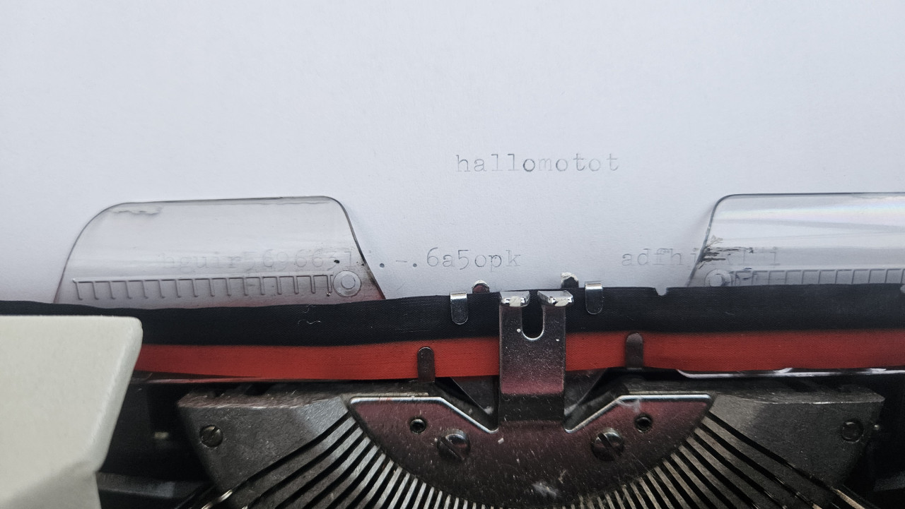 Triumph mechanische typemachine met koffer en handleiding