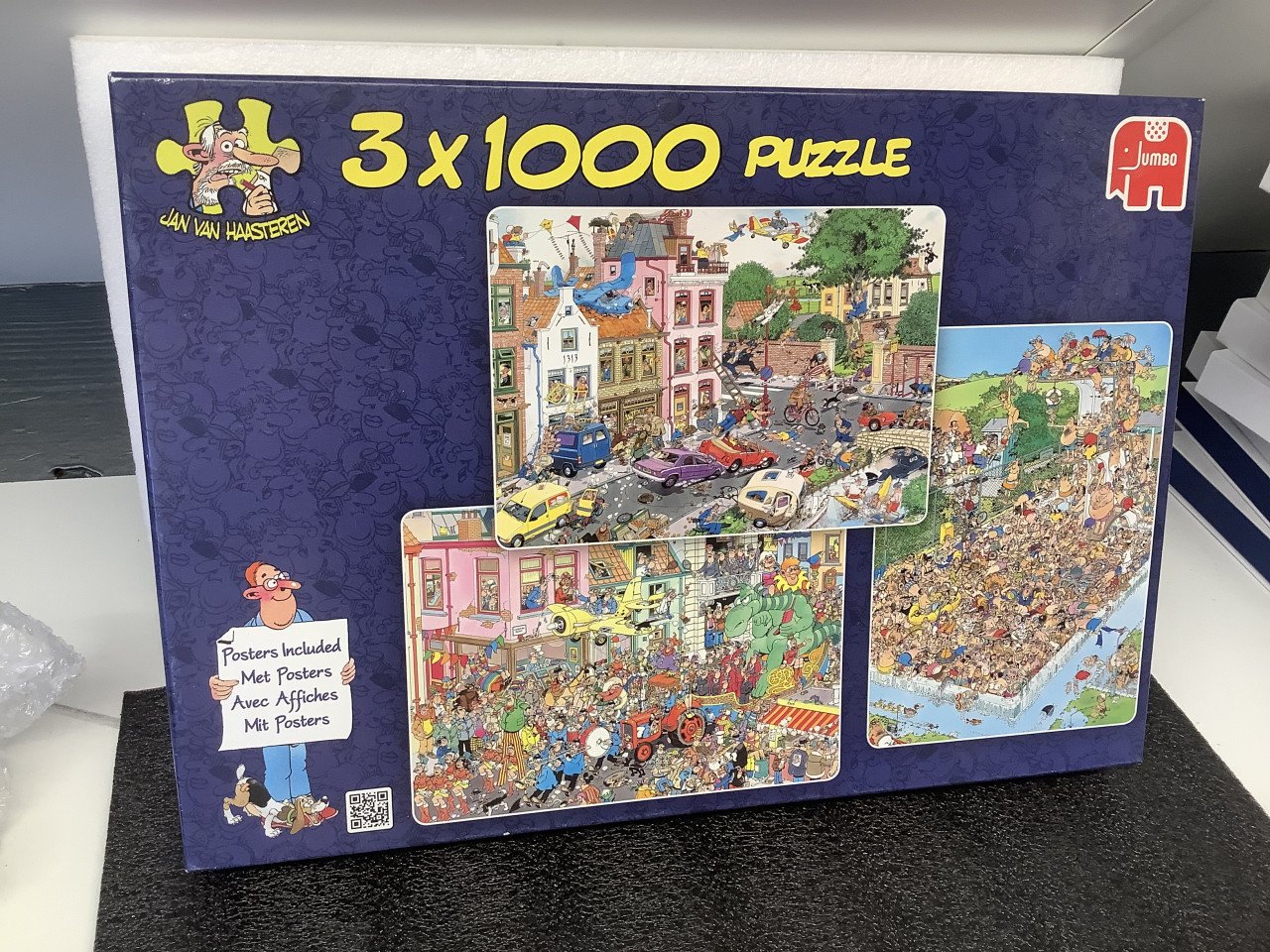 Puzzels van Jan van Haasteren. 1x 1000 en set van 3 x 1000 stukjes.