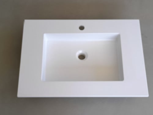 Inbouw wastafel wit. Eigenlijk als nieuw, maar heeft kleine beschadiging