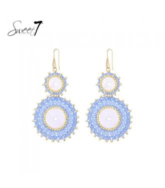 Oorbellen blauw met ronde kralen en goudkleurige details