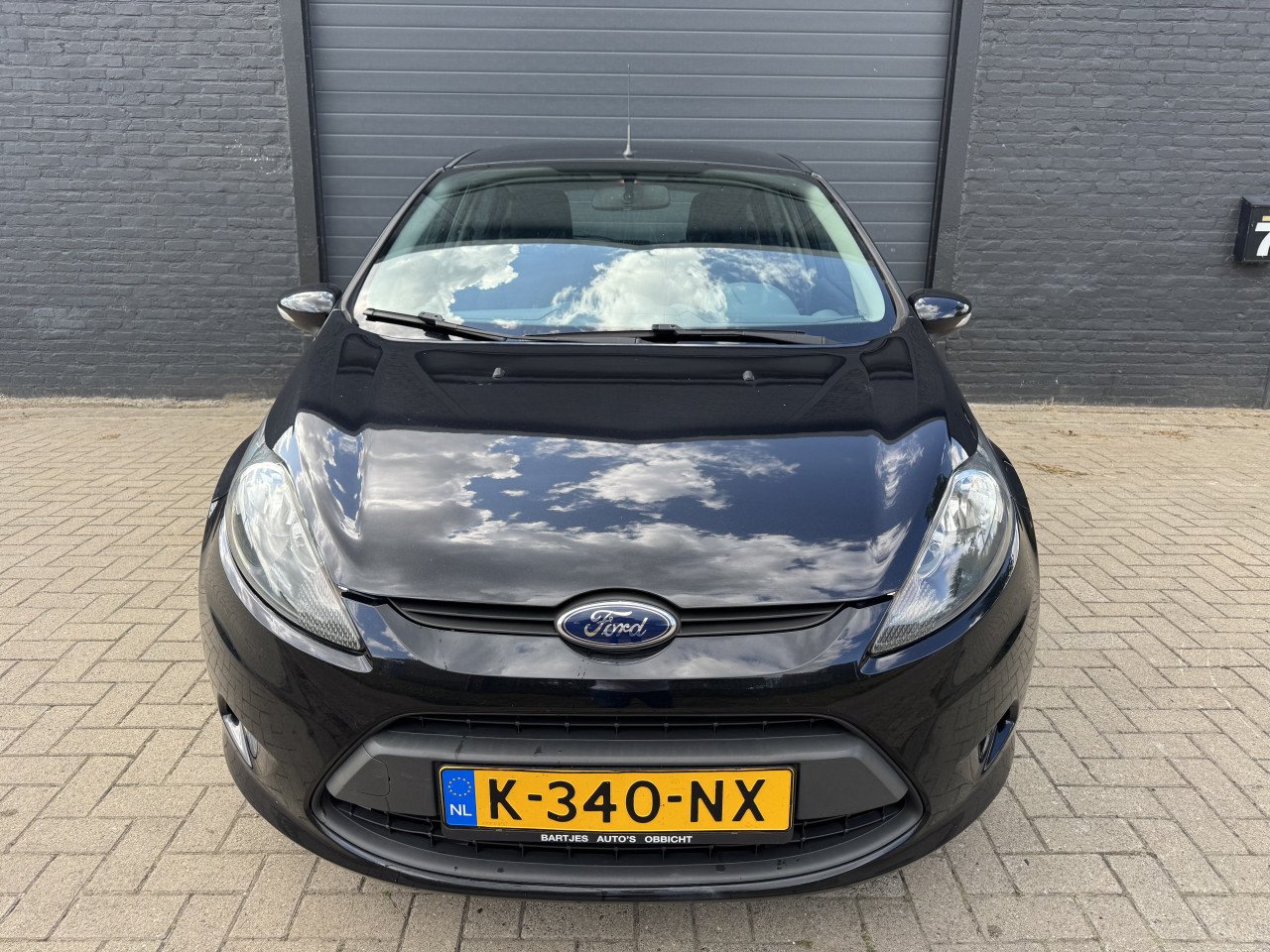 Ford Fiesta 1.25 44KW Ghia 5DRS 2010 Zwart Airco Apk Nap