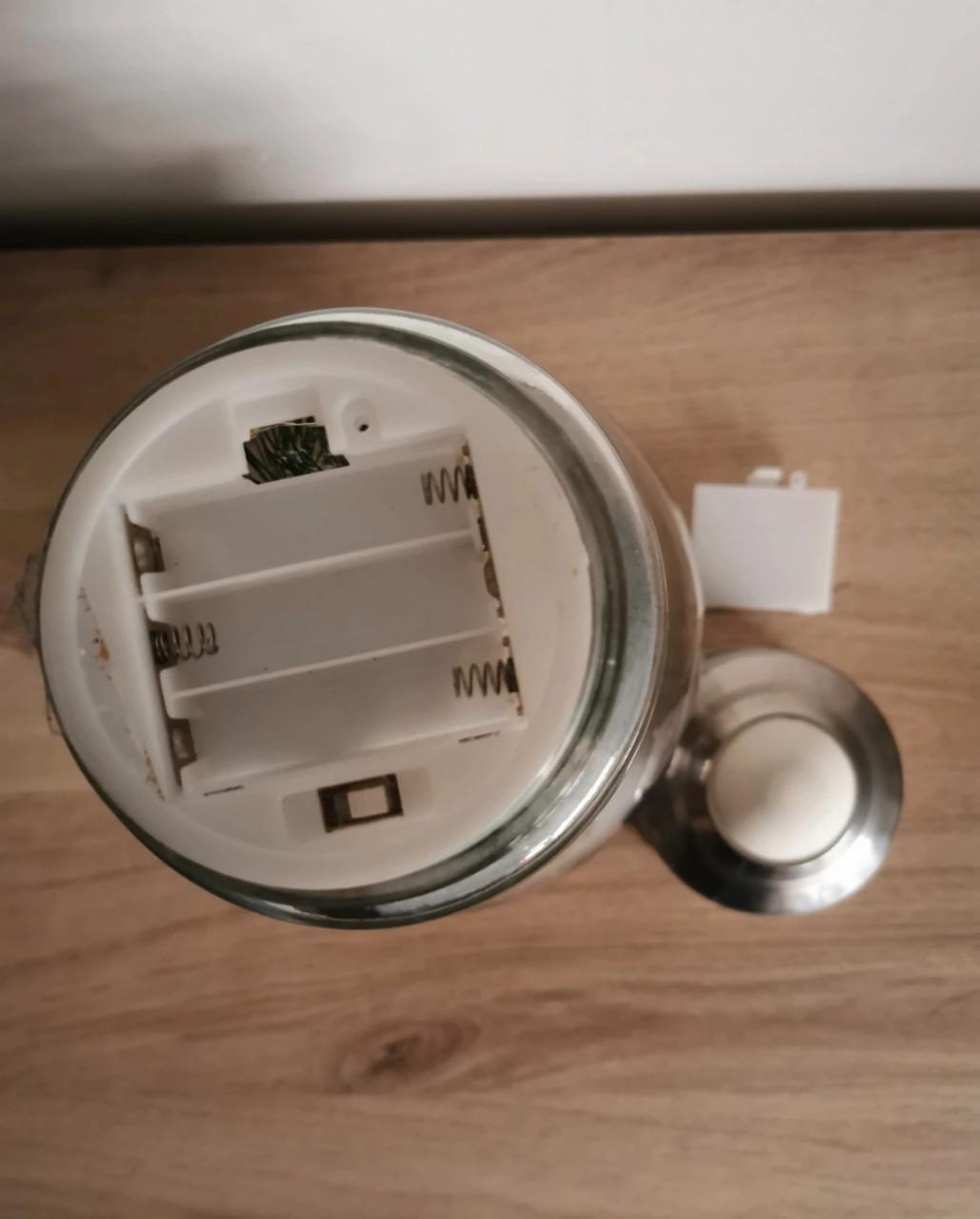 Kerstdecoratie in glazen gloeilamp