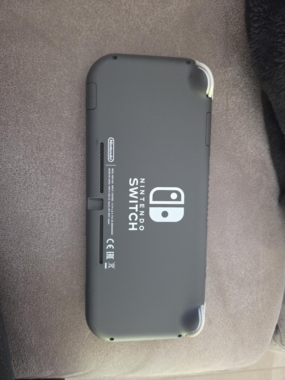 Nintendo Switch Lite grijs en geel evt. incl. spellen