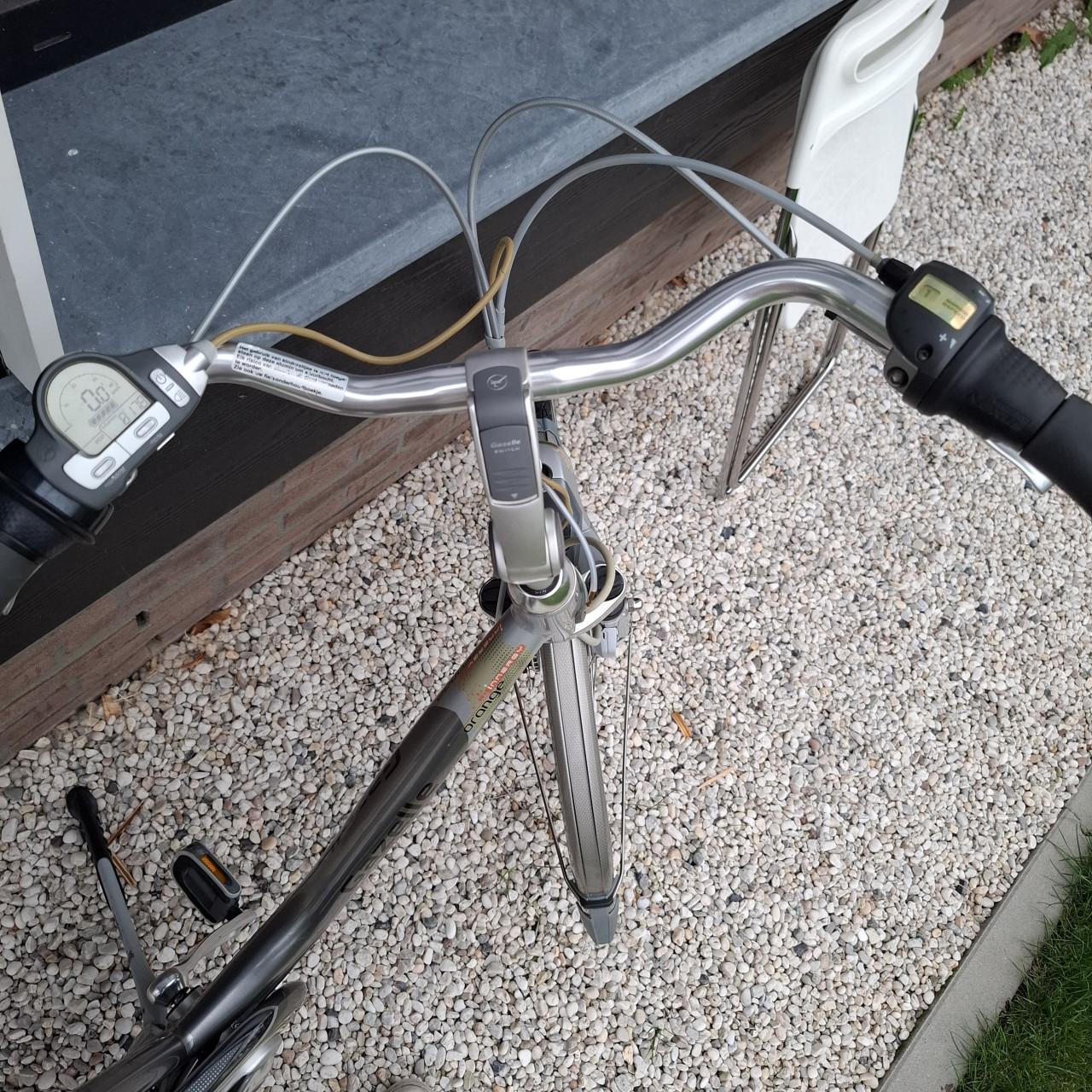 Gazelle orange elektrische dames fiets (met grap)