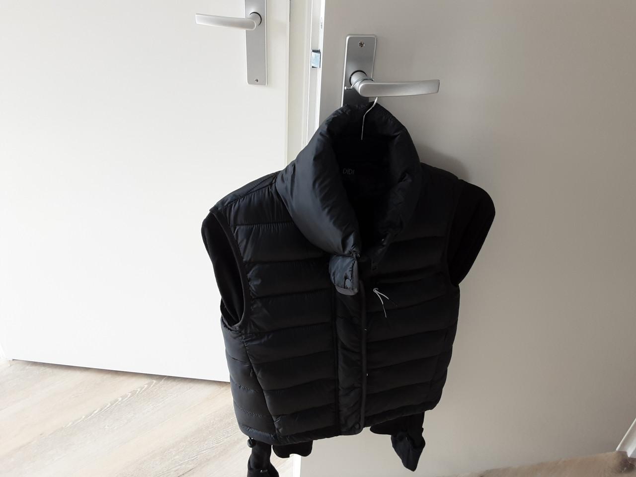 Nieuwe  bodywarmer mt XS