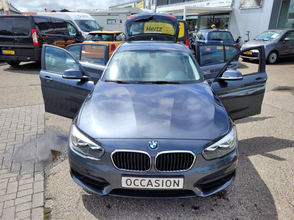 BMW 1 Serie 116i executive advantage . navi climate pdc lm velgen led stoel