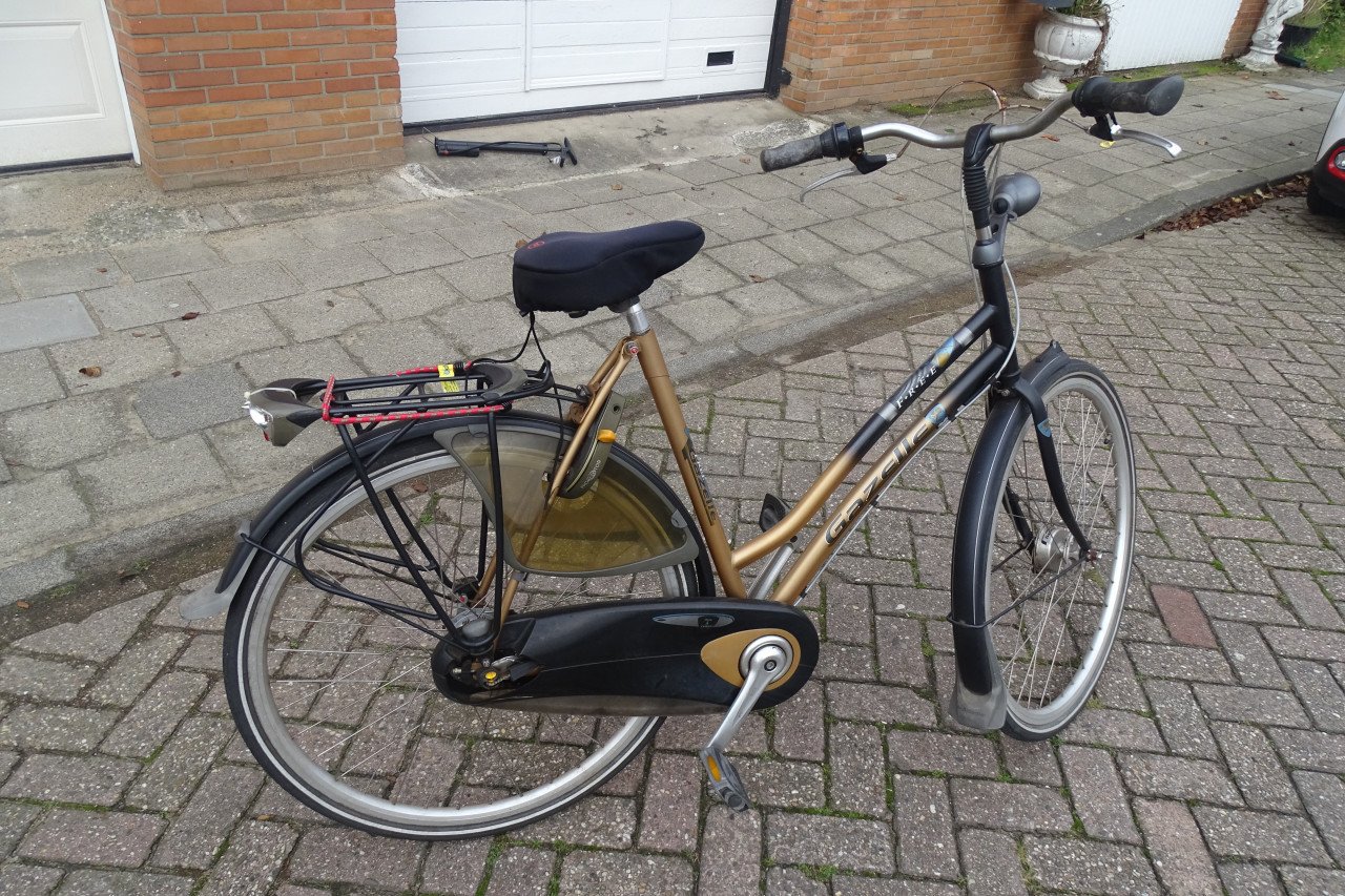 Praktisch nieuwe (Sport-)tandem te koop + Gazelle damesfiets