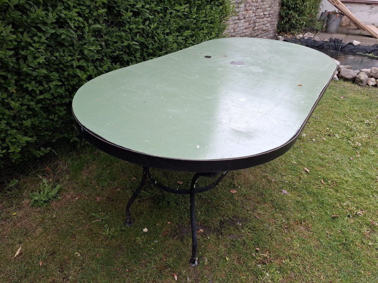 Degelijke Smeedwerk Tuintafel en Betonplex plaat