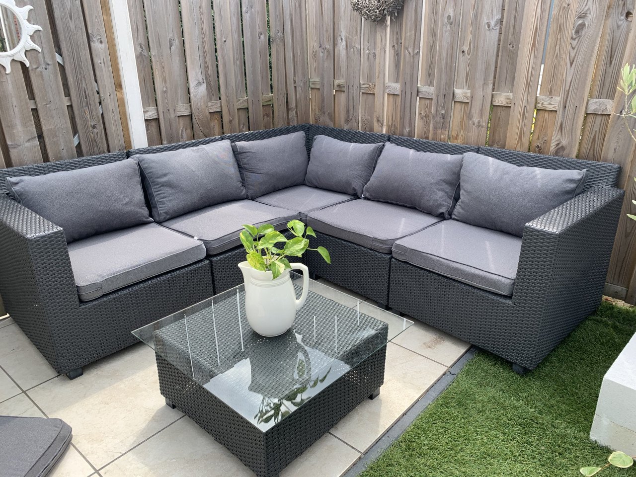 Loungeset zwart wicker, plus tafel plus kussens