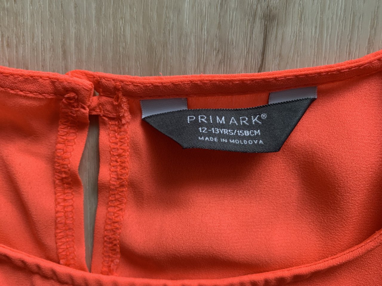 Neon oranje shirt maat 158