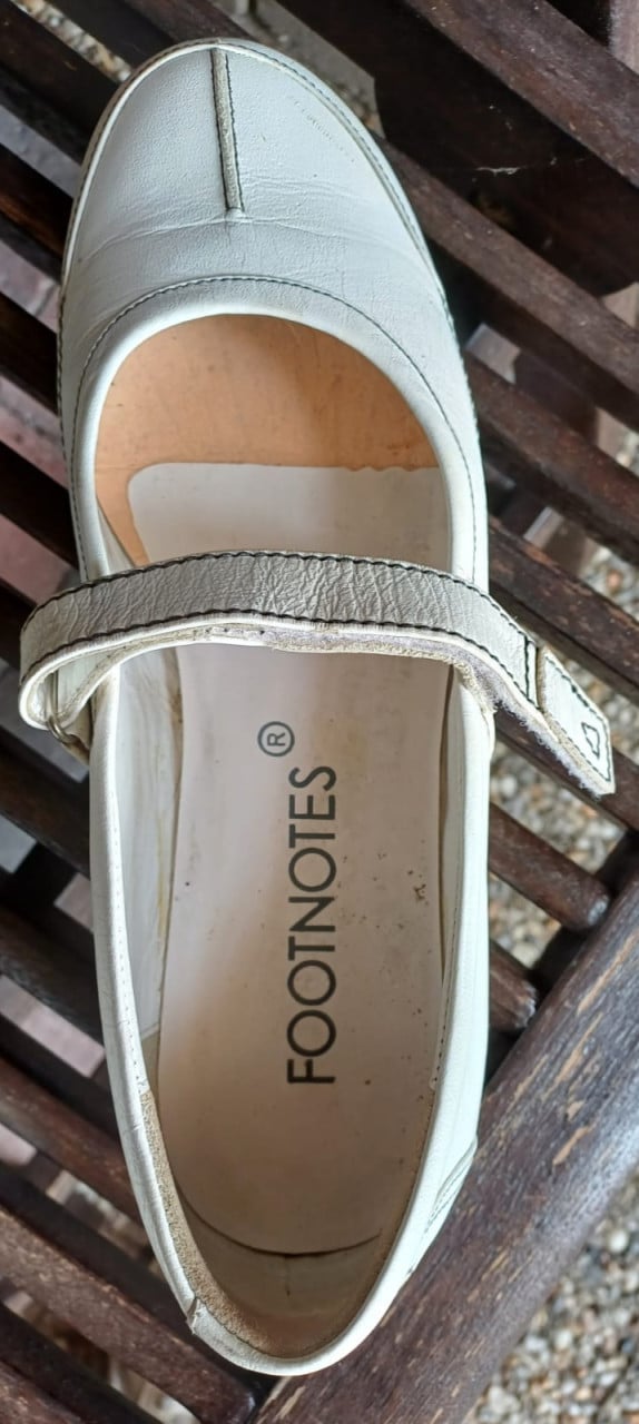 Witte leren ballerina's