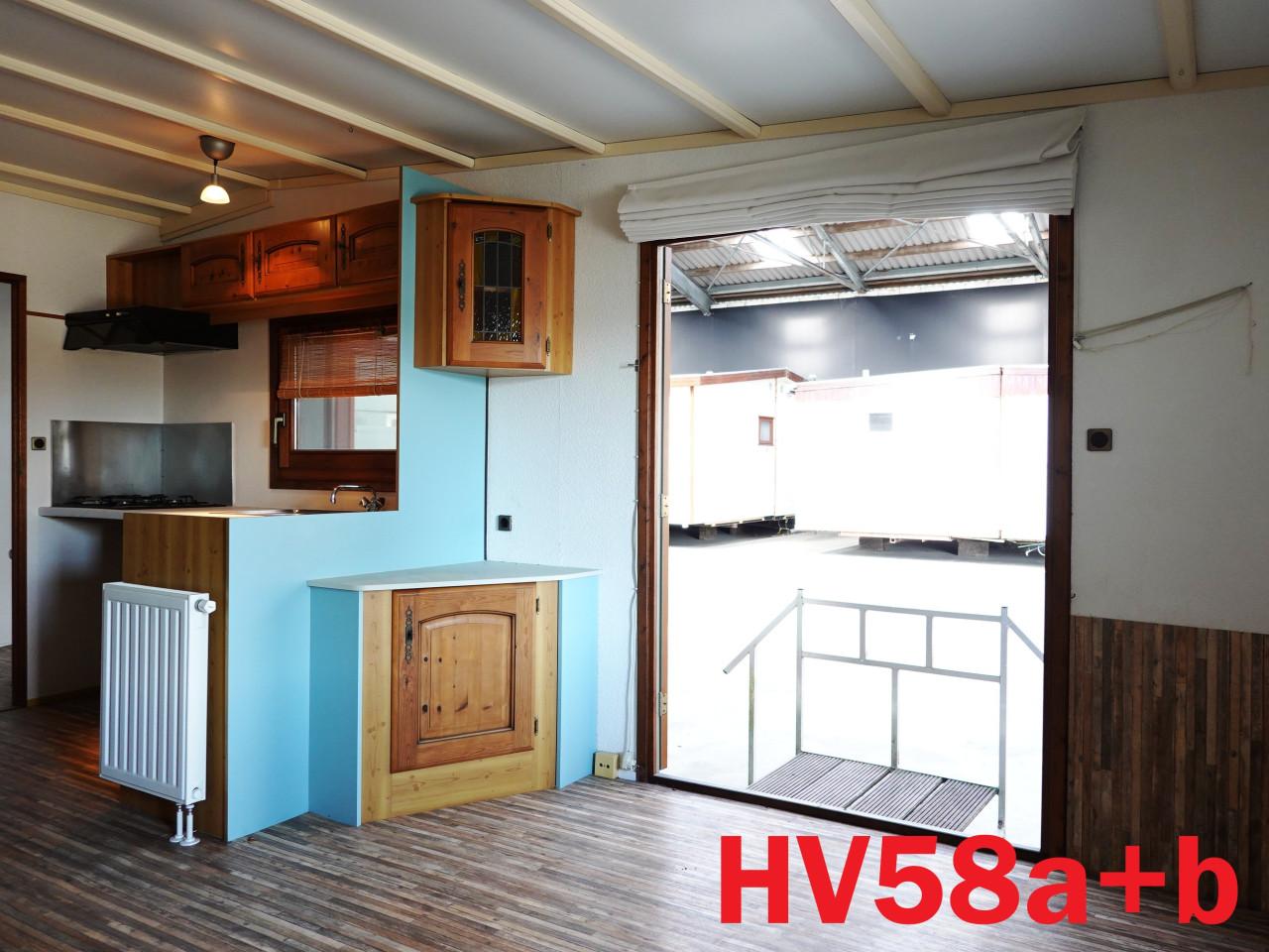 Edelweisz L-chalet met hardhouten kozijnen met dubbel glas en CV te koop