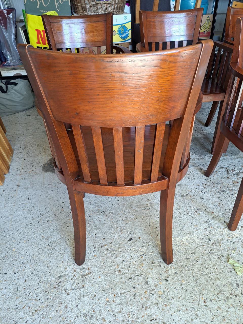 Te koop 5 houten eetkamer stoelen