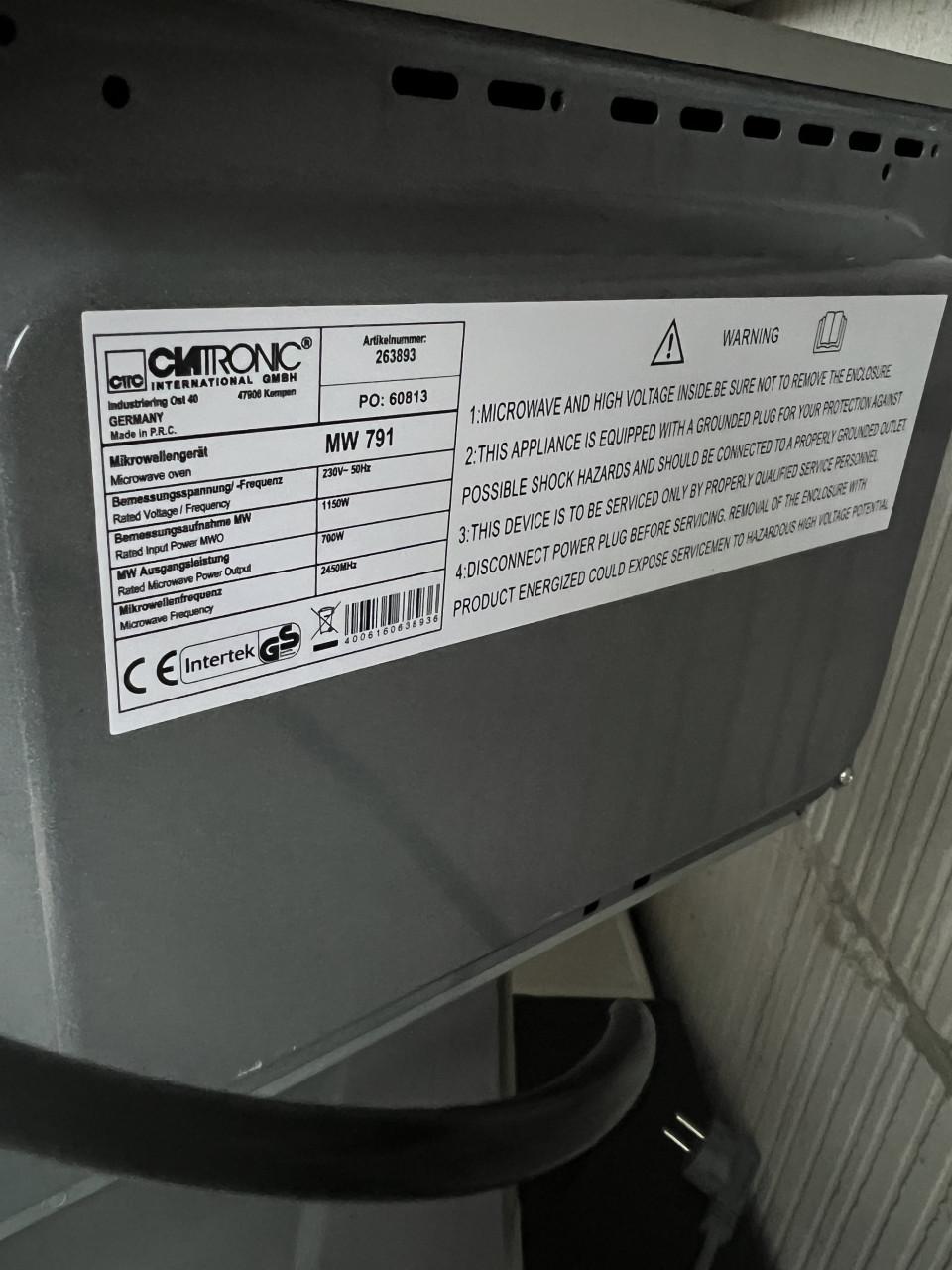 Als nieuw en kort gebruikte zilveren Magnetron nieuwprijs €70,-