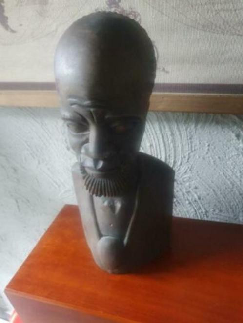 Heel mooi antiek houtsnijwerk beeldje uit indonesie van teak hout