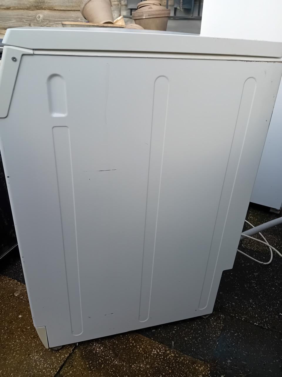 Wasmachine boven lader