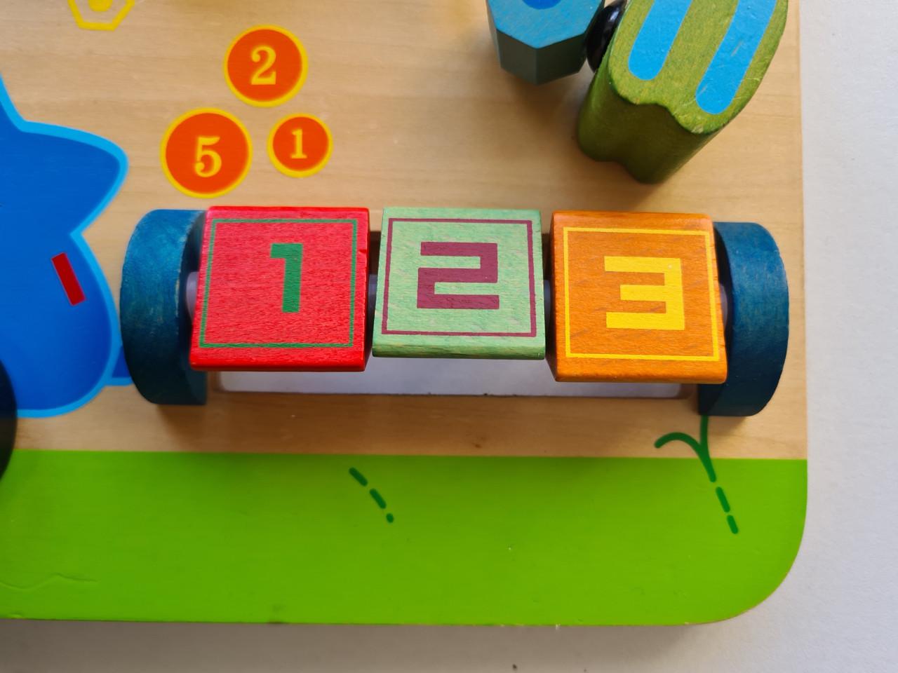 Primi Passi houten activiteitenbord in Garage-thema