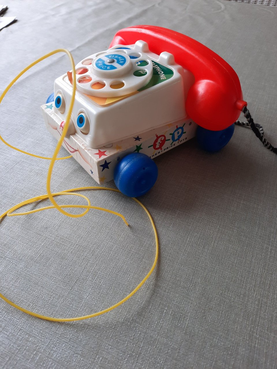 Fisher price telefoon + pluchen baby bal.