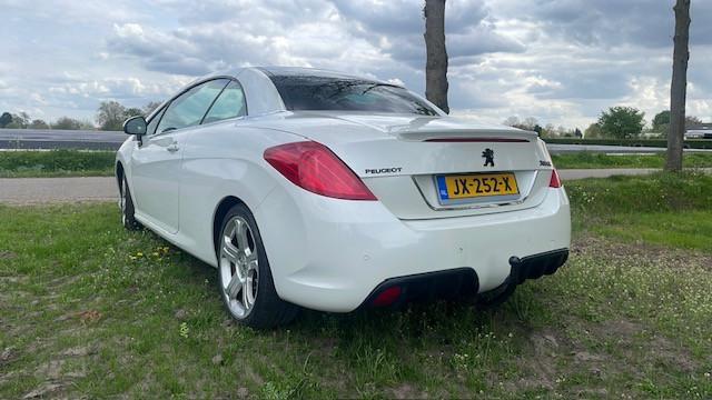 Zeer mooie peugeot 308cc cabrio parelmoet wit weinig km nu 5499 euro