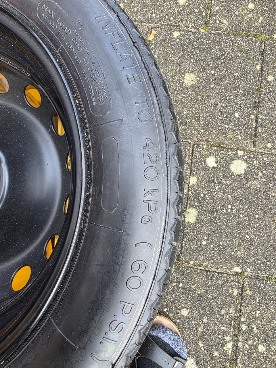 Thuiskomer (reservewiel)