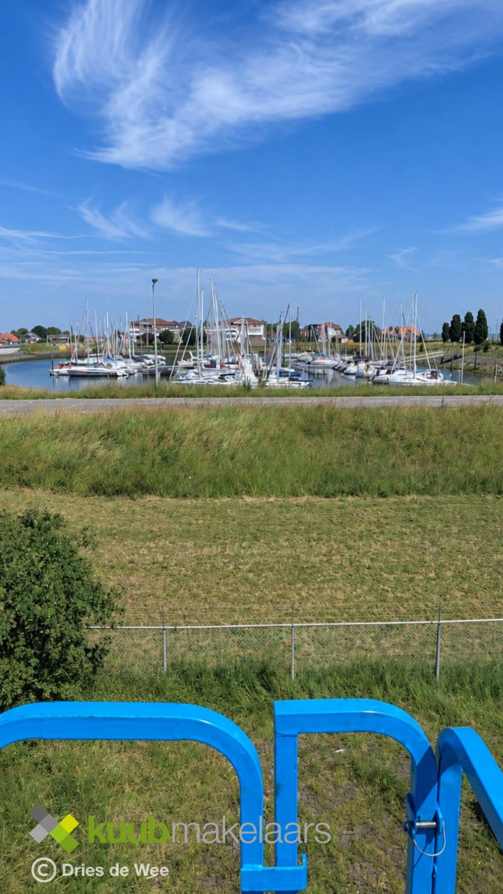 Wil je schitterende foto's maken van Wemeldinge vanuit een hoogwerker?