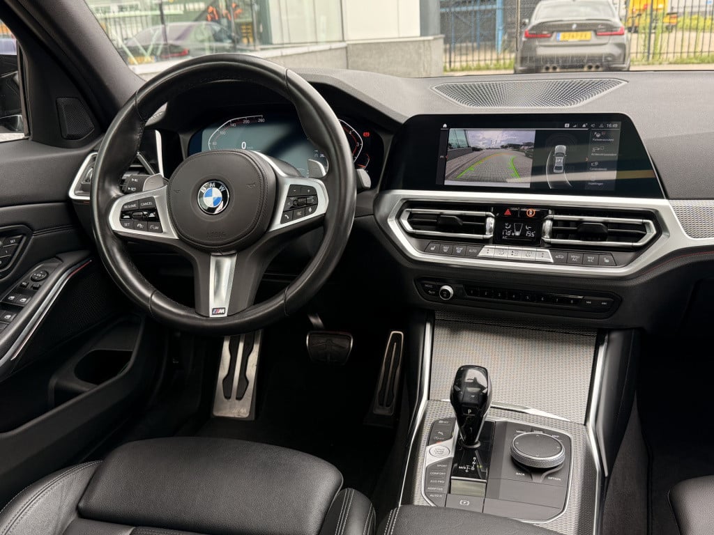 BMW 3-serie 320i m-sport | schuifdak | acc | leder | memory | laser | 20 in