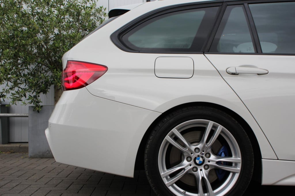 BMW 3-serie touring 318i m sport edition aut. - navi groot - adap led - pdc