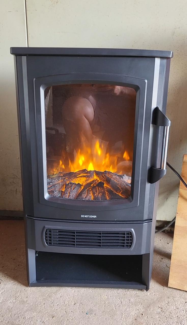 Elektrische sfeerhaard met verwarmings element